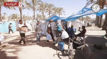 الخيرية توزع 2000 طرد مساعدات لمساعدة غزة.webp